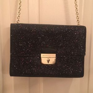 Kate spade New York small black shiny purse with